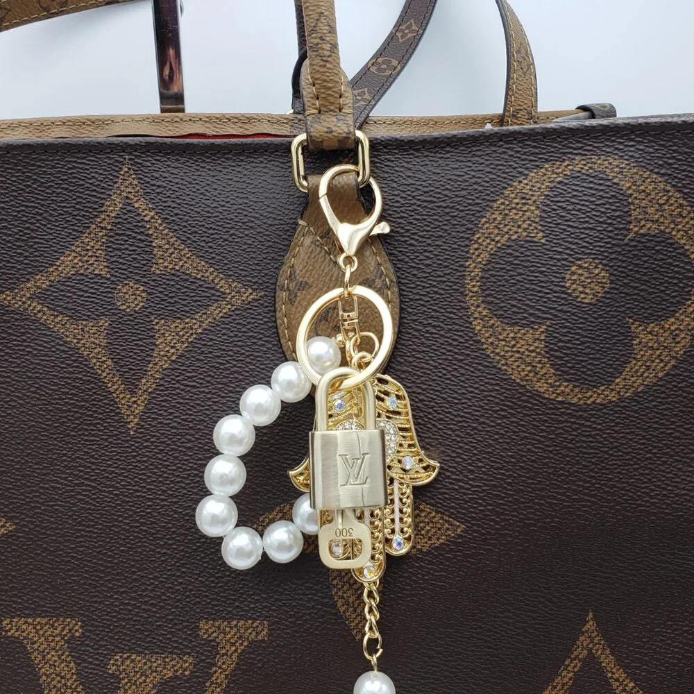 Louis Vuitton Gold Lock 🔒 Authentic LV Key + Unbranded Evil Eye Bag Charm